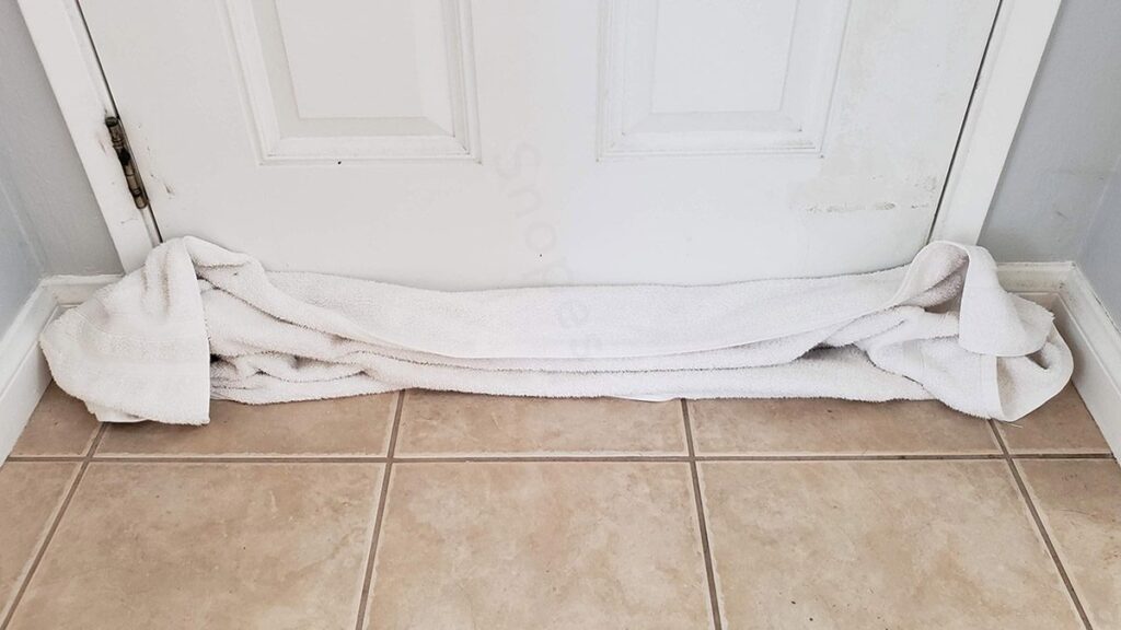 why-put-towel-under-hotel-door